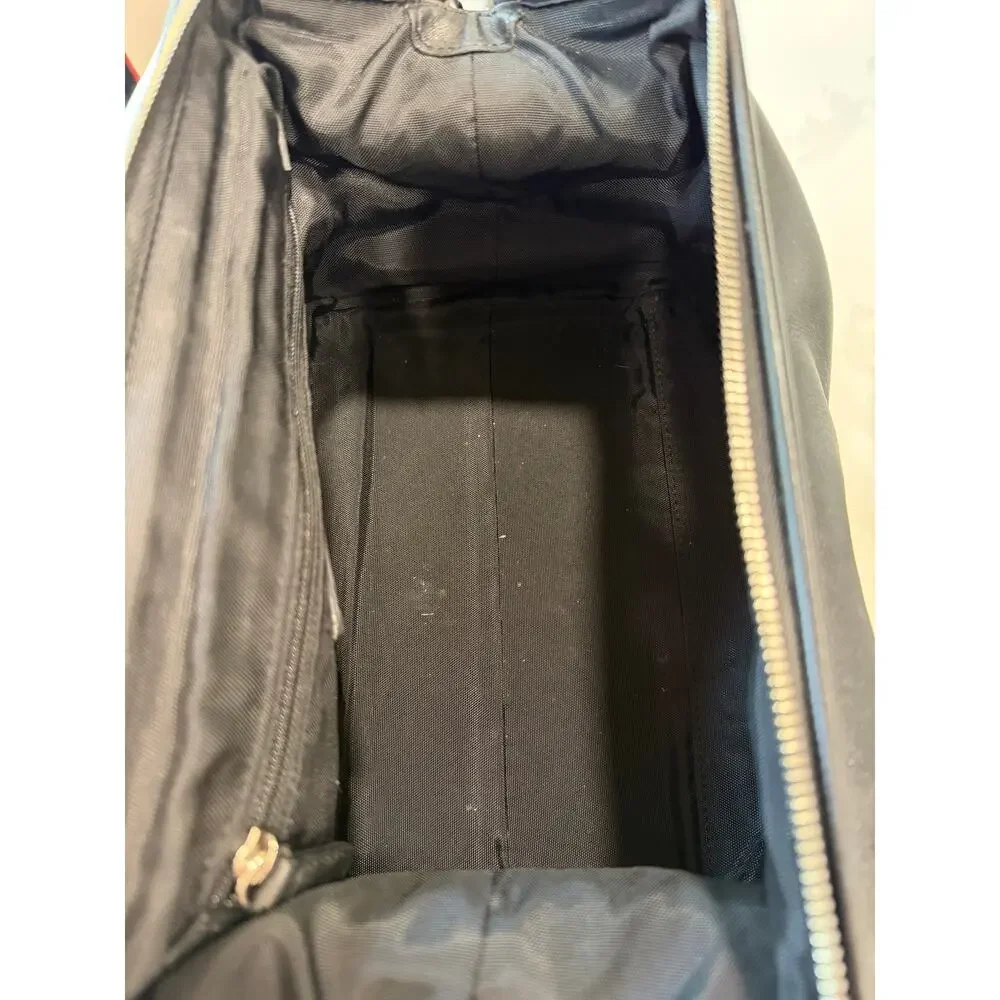 Coach black leather toiletry bag